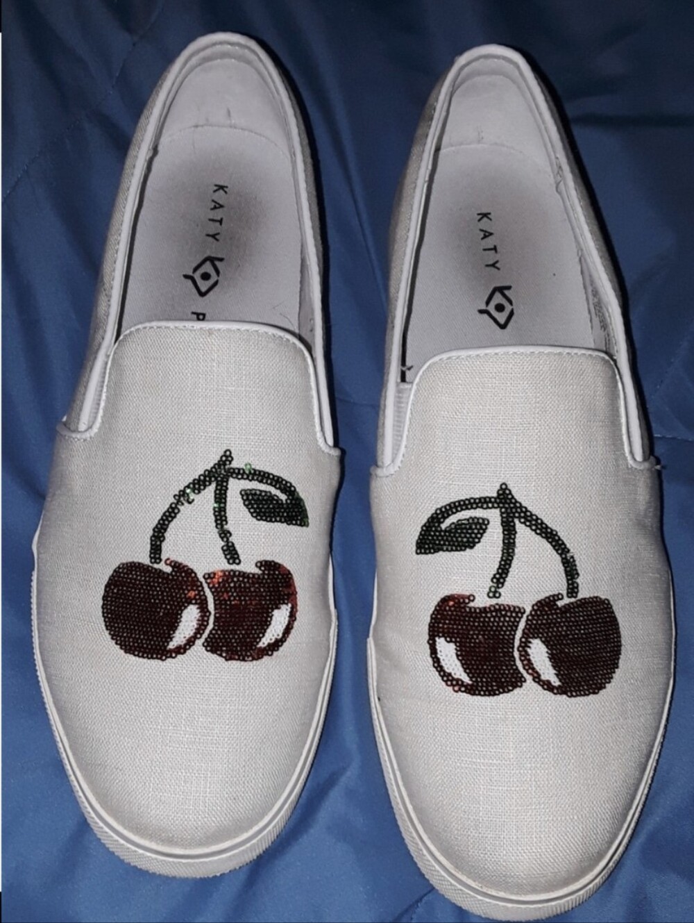 Katy Perry Collections White Slip-On Sneakers with Red Cherry Motif